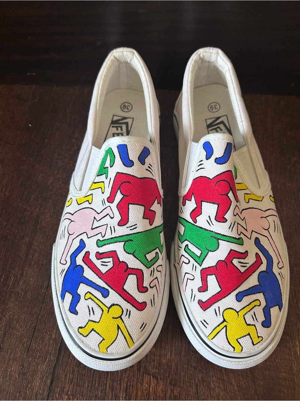 Keith Haring x Vans white slip on shoes